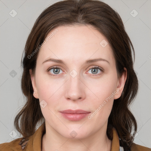 Joyful white young-adult female with medium  brown hair and blue eyes