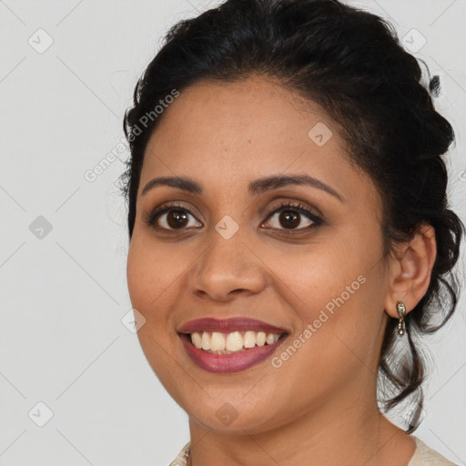 Joyful latino young-adult female with long  brown hair and brown eyes