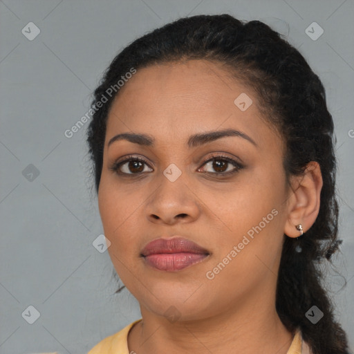 Joyful latino young-adult female with long  brown hair and brown eyes