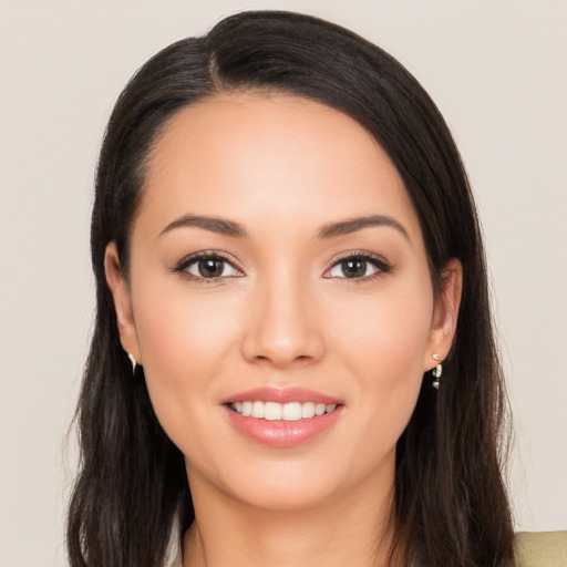 Joyful white young-adult female with long  black hair and brown eyes