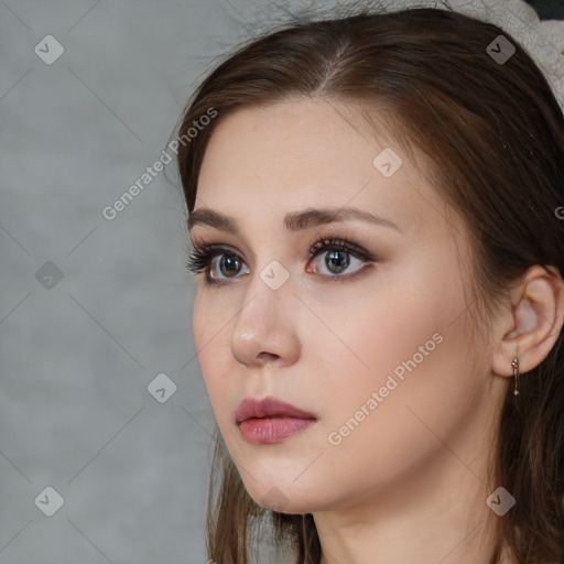 Neutral white young-adult female with long  brown hair and brown eyes