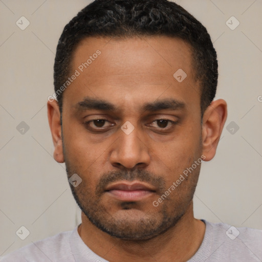 Neutral latino young-adult male with short  black hair and brown eyes
