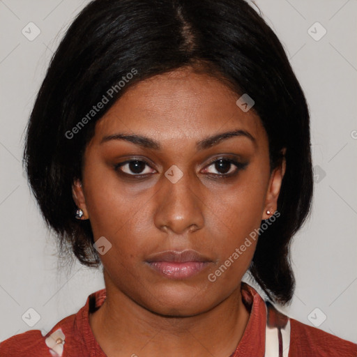 Neutral black young-adult female with medium  black hair and brown eyes