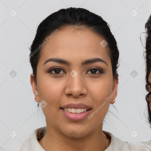 Joyful latino young-adult female with short  brown hair and brown eyes