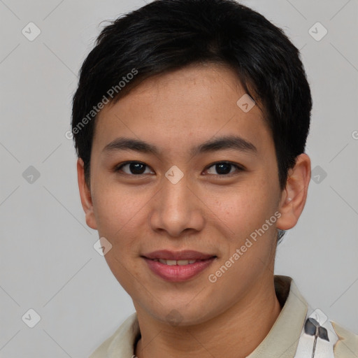 Joyful asian young-adult male with short  brown hair and brown eyes