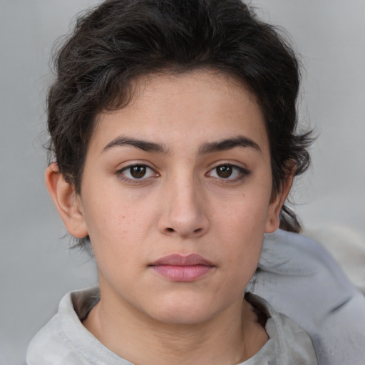 Neutral white young-adult female with short  brown hair and brown eyes