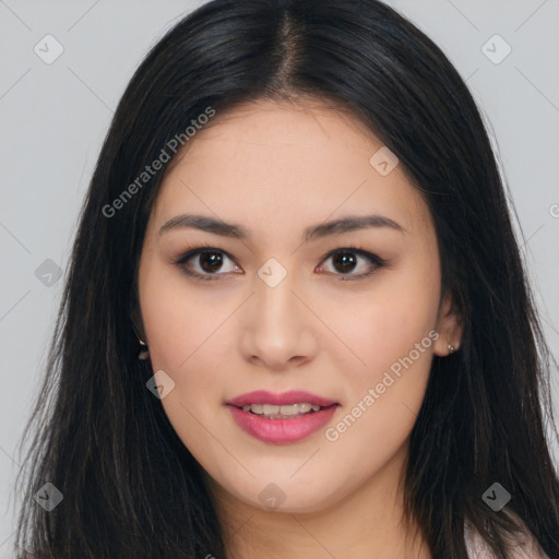 Joyful asian young-adult female with long  brown hair and brown eyes