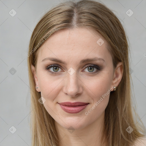 Joyful white young-adult female with long  brown hair and green eyes