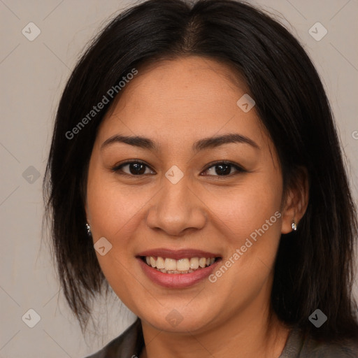 Joyful asian young-adult female with long  brown hair and brown eyes