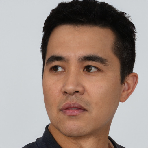 Neutral asian young-adult male with short  black hair and brown eyes