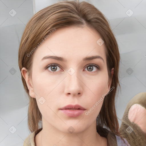 Neutral white young-adult female with medium  brown hair and grey eyes