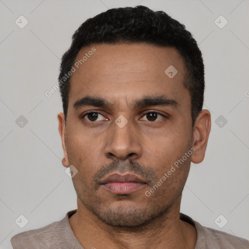 Neutral latino young-adult male with short  black hair and brown eyes