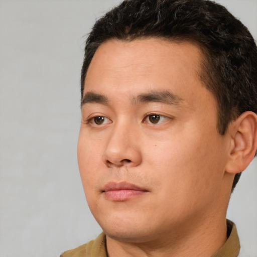 Neutral latino young-adult male with short  brown hair and brown eyes