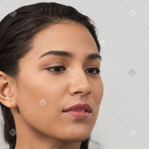 Neutral white young-adult female with medium  brown hair and brown eyes