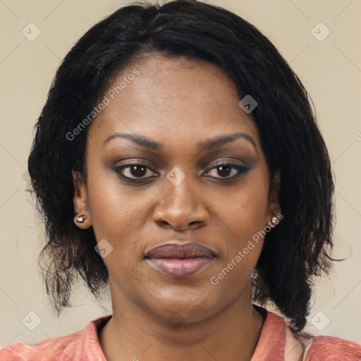 Joyful black young-adult female with medium  black hair and brown eyes