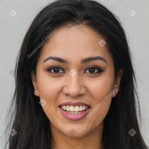 Joyful latino young-adult female with long  brown hair and brown eyes