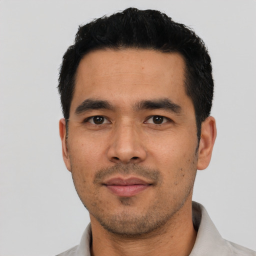 Neutral asian young-adult male with short  black hair and brown eyes