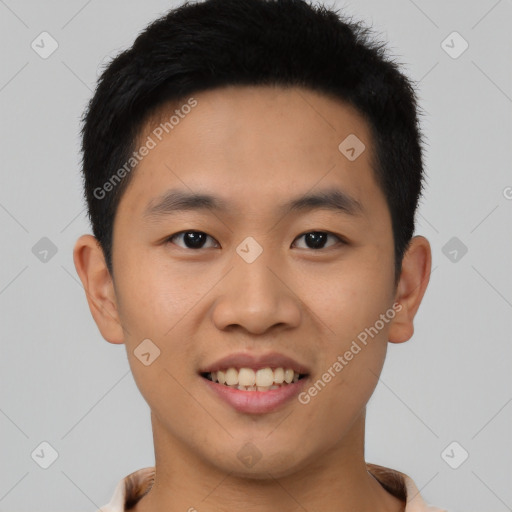 Joyful asian young-adult male with short  black hair and brown eyes