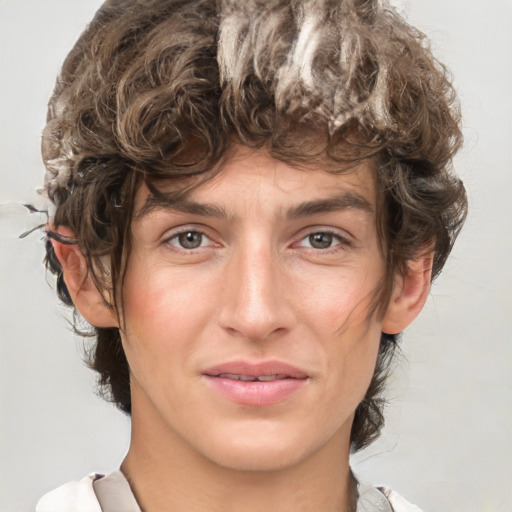 Joyful white adult male with medium  brown hair and brown eyes