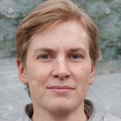 Joyful white adult male with short  brown hair and grey eyes