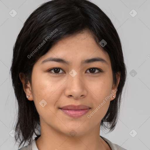 Joyful asian young-adult female with medium  black hair and brown eyes