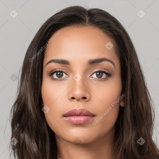 Neutral white young-adult female with long  brown hair and brown eyes