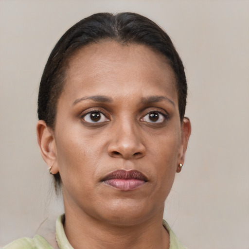Neutral black adult female with short  brown hair and brown eyes