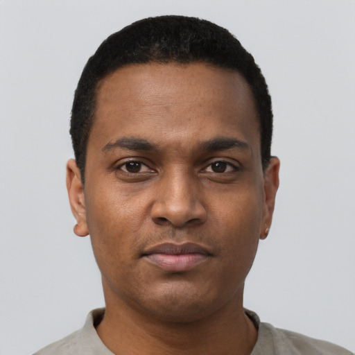 Neutral black young-adult male with short  black hair and brown eyes