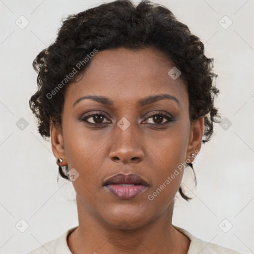 Neutral black young-adult female with short  brown hair and brown eyes