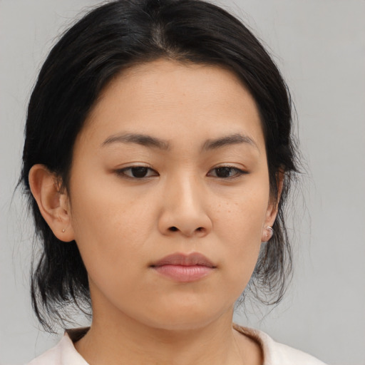 Neutral asian young-adult female with medium  black hair and brown eyes