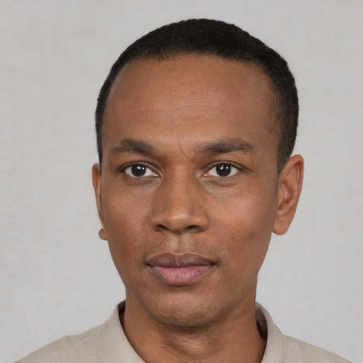 Neutral black young-adult male with short  black hair and brown eyes