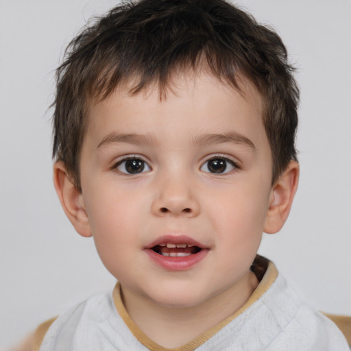 Joyful white child male with short  brown hair and brown eyes