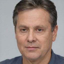 Joyful white middle-aged male with short  brown hair and brown eyes