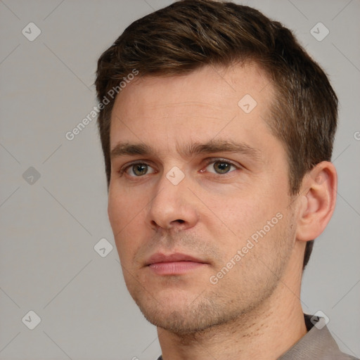 Neutral white young-adult male with short  brown hair and brown eyes