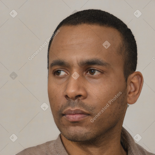 Neutral black young-adult male with short  black hair and brown eyes