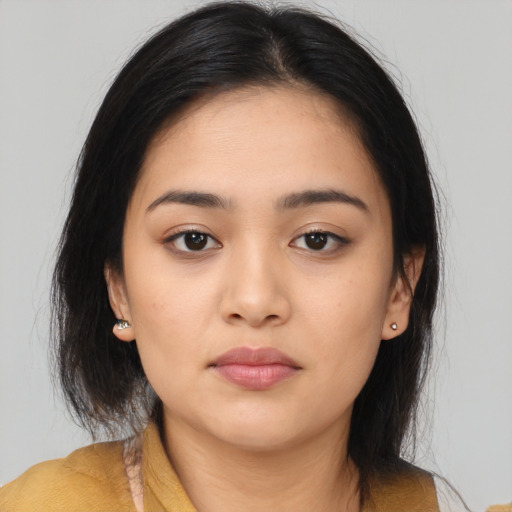 Neutral latino young-adult female with medium  black hair and brown eyes