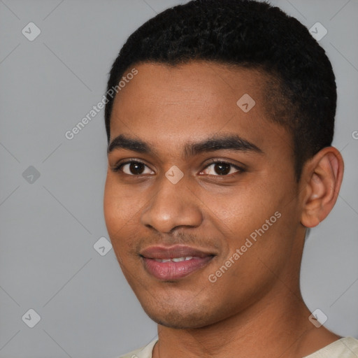 Joyful black young-adult male with short  black hair and brown eyes