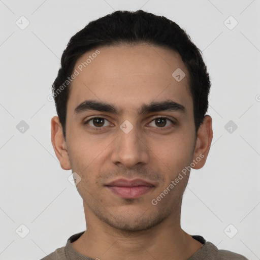 Neutral latino young-adult male with short  black hair and brown eyes