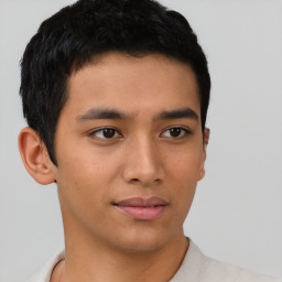 Neutral asian young-adult male with short  brown hair and brown eyes