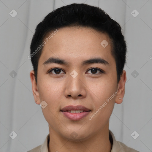 Joyful latino young-adult male with short  black hair and brown eyes