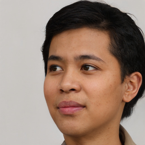 Neutral asian young-adult male with short  black hair and brown eyes