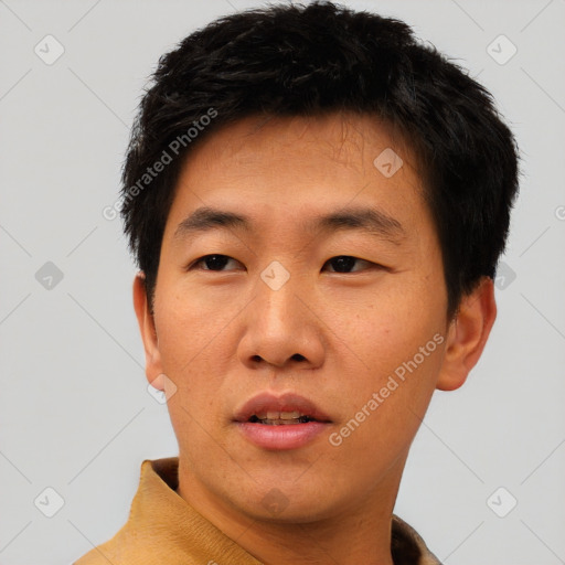 Neutral asian young-adult male with short  black hair and brown eyes