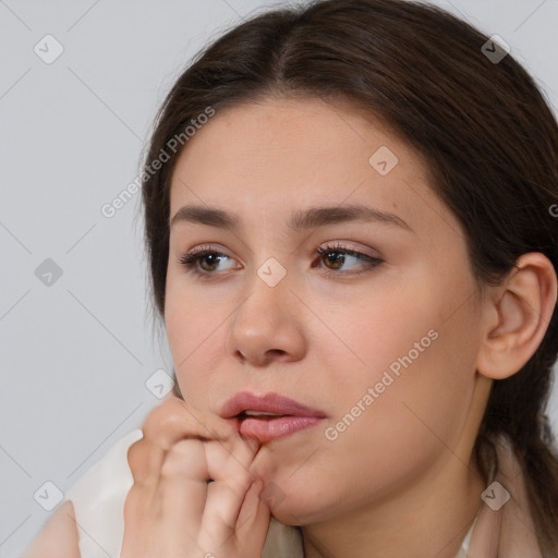 Neutral white young-adult female with medium  brown hair and brown eyes