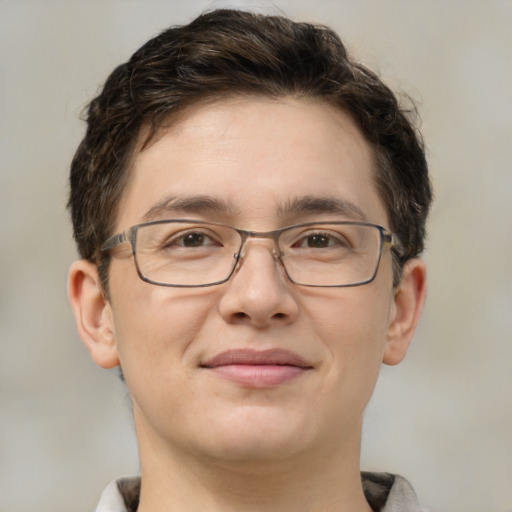 Joyful white adult male with short  brown hair and grey eyes