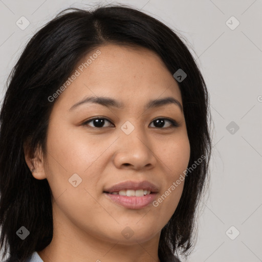 Joyful asian young-adult female with long  brown hair and brown eyes