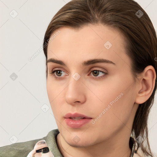 Neutral white young-adult female with medium  brown hair and brown eyes