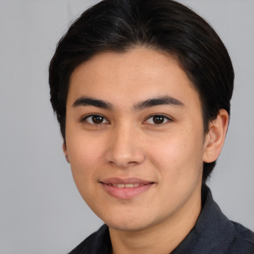 Joyful white young-adult male with medium  brown hair and brown eyes