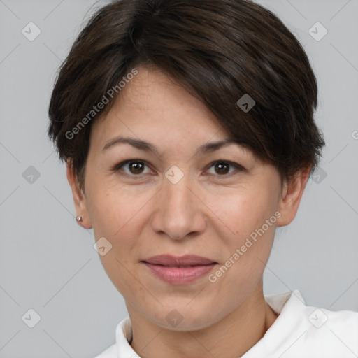 Joyful white adult female with short  brown hair and brown eyes