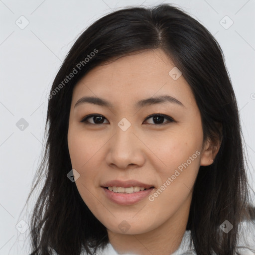 Joyful asian young-adult female with long  brown hair and brown eyes