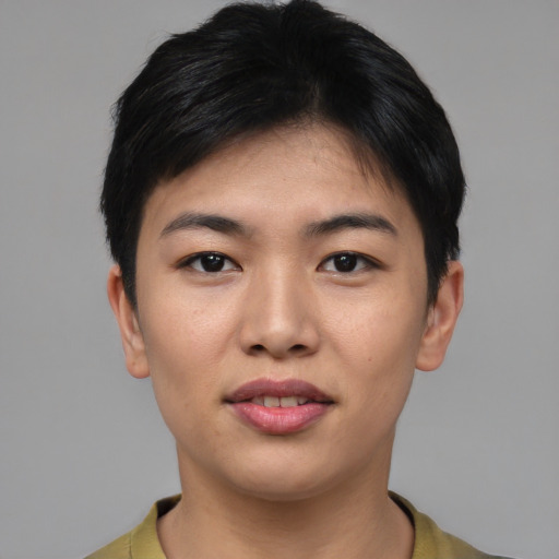 Joyful asian young-adult female with short  black hair and brown eyes
